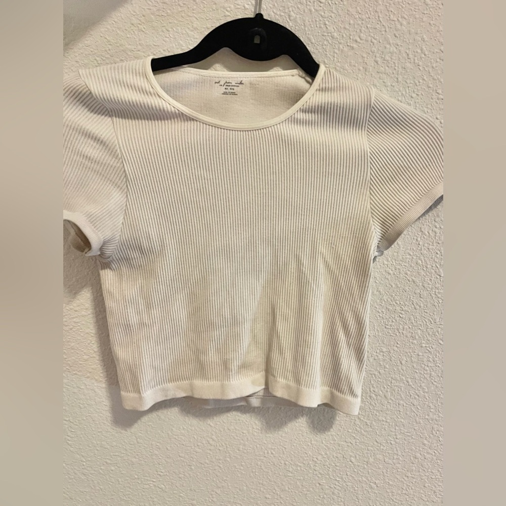out from under white crop top